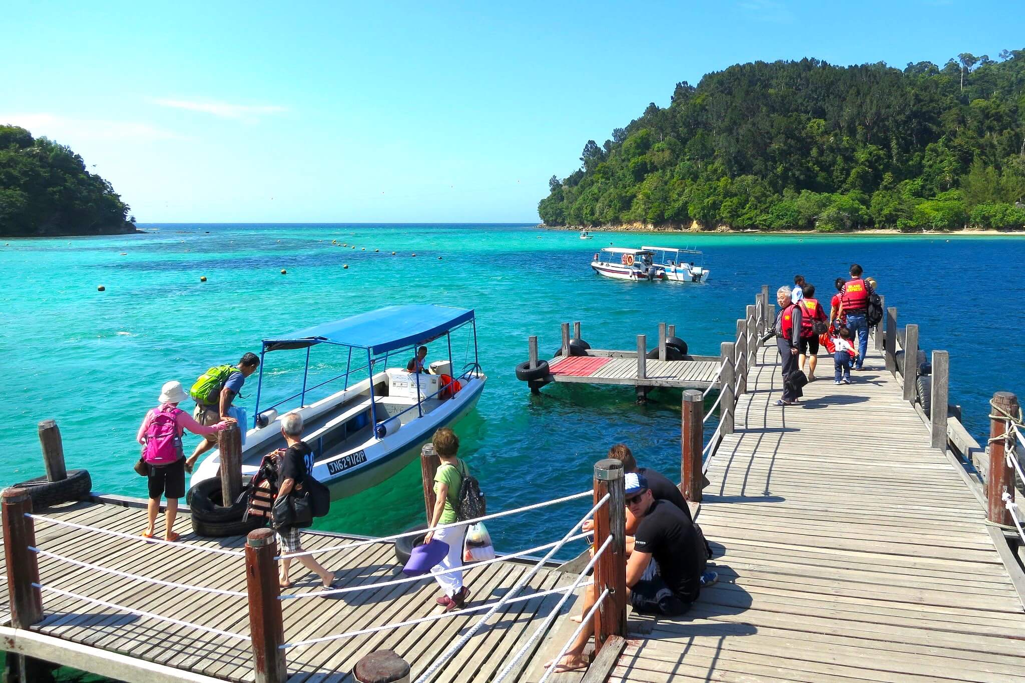 Board into this open-space boat from Sutera Harbour Marina Jetty.