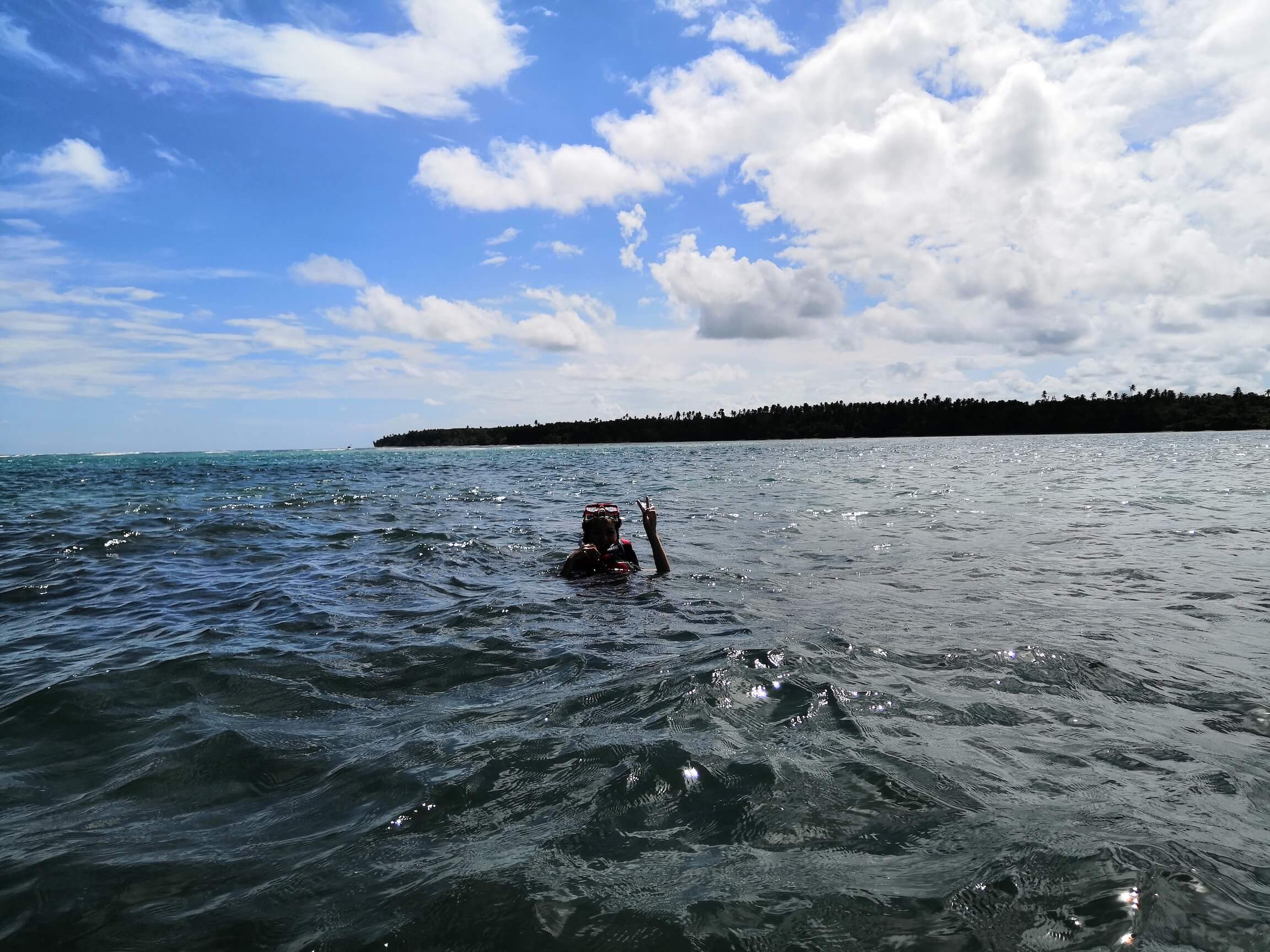 Snorkel into the clear waters of Tambisan Island.