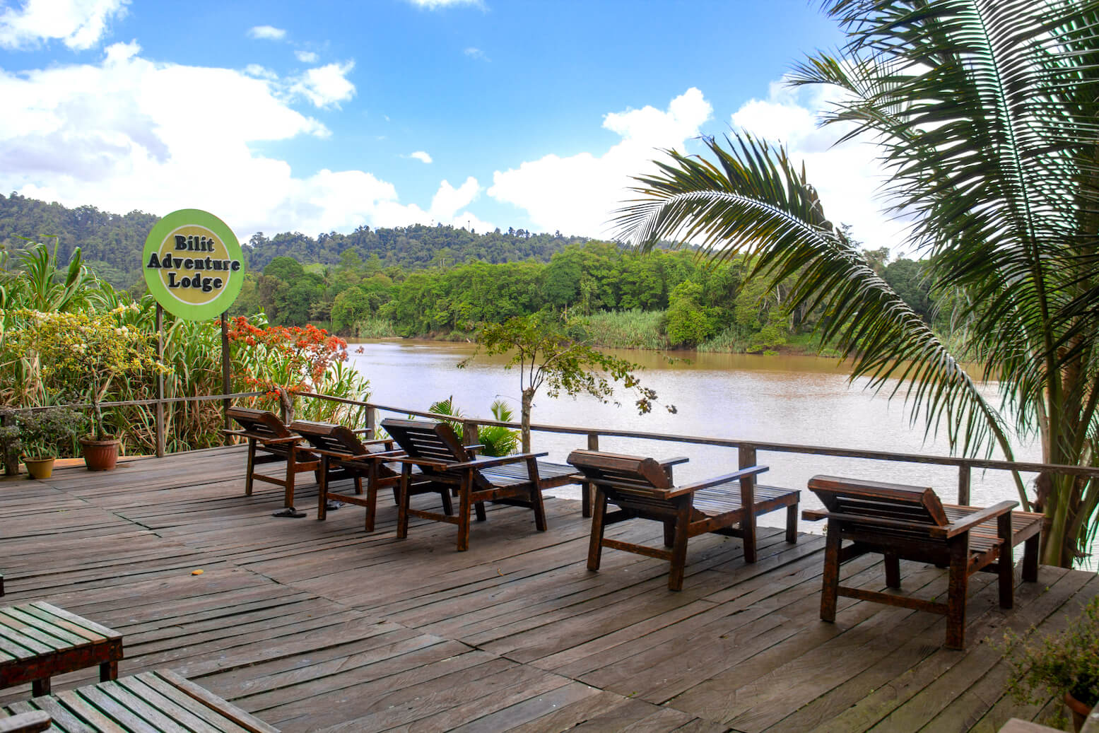 Lounge around at Bilit Adventure Lodge platform overlooking the tranquil view of Kinabatangan River.