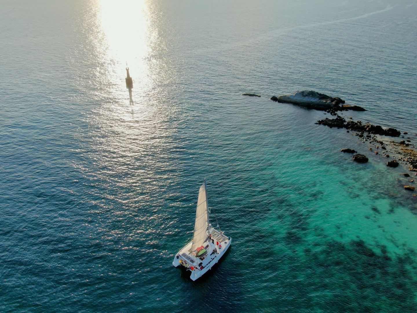 UDream sailing peacefully on the clear waters of Tunku Abdul Rahman Park