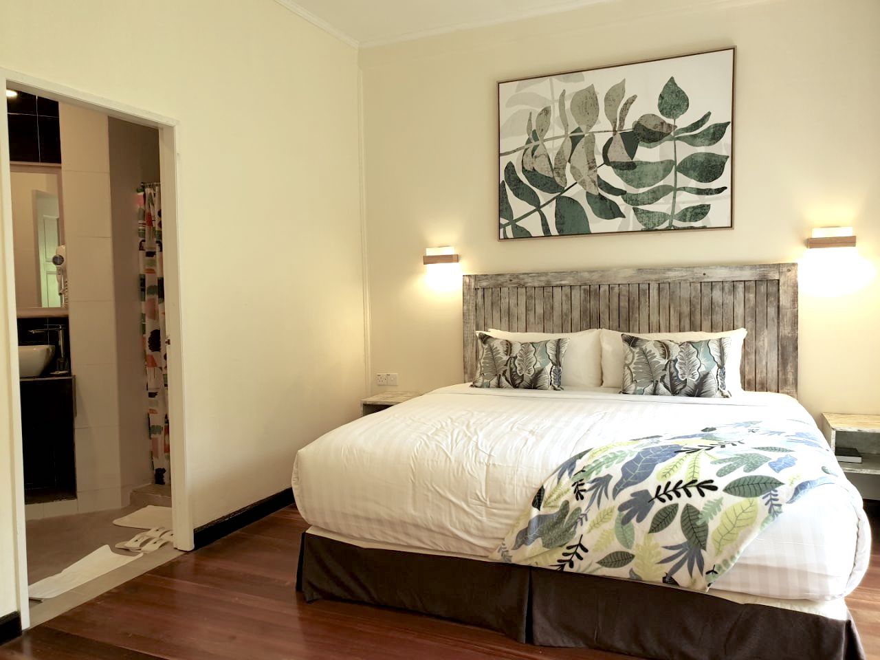 A cosy and newly renovated main bedroom at Nepenthes Suite.